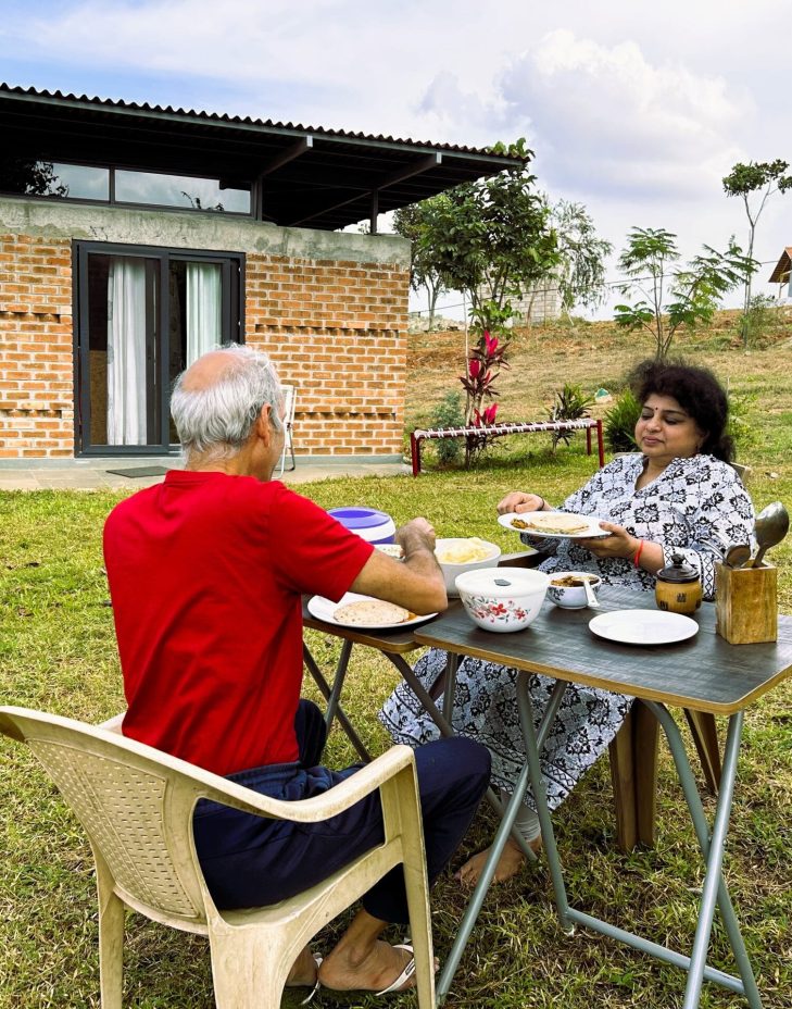 Enjoying-breakfast-outside-at-cottage-scaled